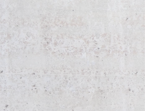 Textured white stone wall